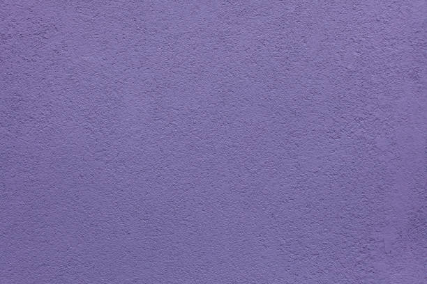 istock Purple painted stucco wall. Background texture. 1132644961