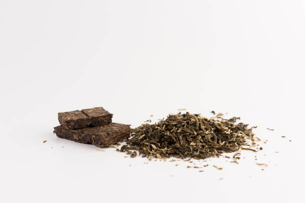 istock Pile of green tea isolated on white background 1132647433