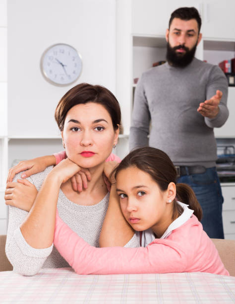 istock Father lecturing wife and daughter 1132647787