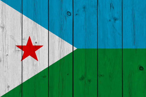 Djibouti flag painted on old wood plank Djibouti flag painted on old wood plank. Patriotic background. National flag of Djibouti flag of djibouti stock pictures, royalty-free photos & images