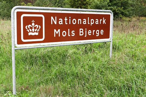 Road sign with national park of Mols Bjerge in Denmark