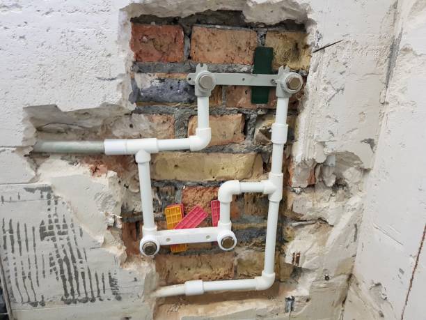 istock propylene pipe and gates in a brick wall - propylene welding 1132657235