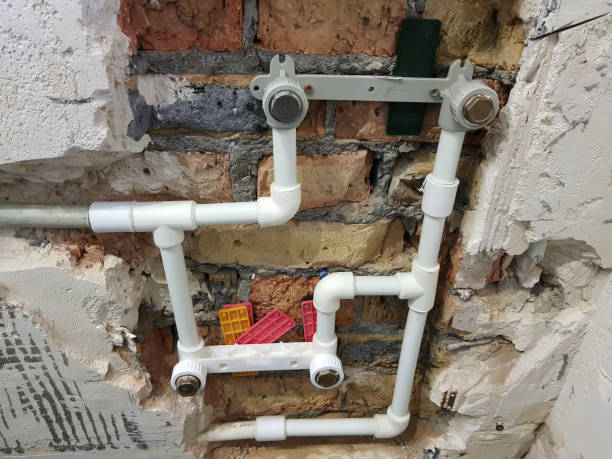 istock propylene pipe and gates in a brick wall - propylene welding 1132657306