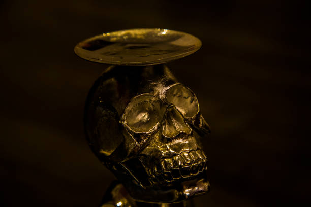 Gold shiny skull with reflection