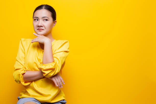 istock Woman show disgust gesture isolated over yellow background 1132675367