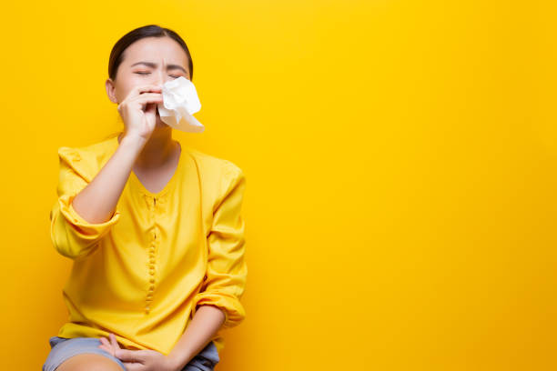 istock Sad woman crying and wipe her tears by tissue paper 1132675475