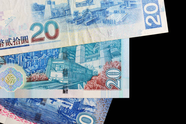 istock Three different bills in twenty Hong Kong dollars on a dark background close up 1132676159