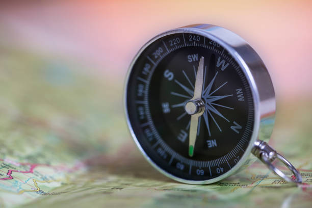 istock Compass on map. Travel and adventure Concept. 1132676200