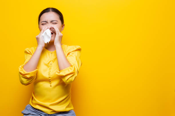 istock Woman use tissue paper after she sneezing 1132676274