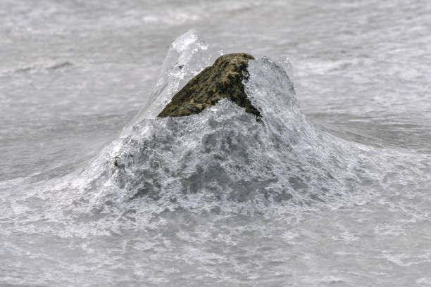 istock Rock Cracking Ice, Lofoten Islands, Norway 1132677335
