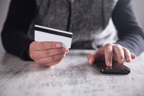 istock Hands with smartphone and credit card. Shopping 1132684140