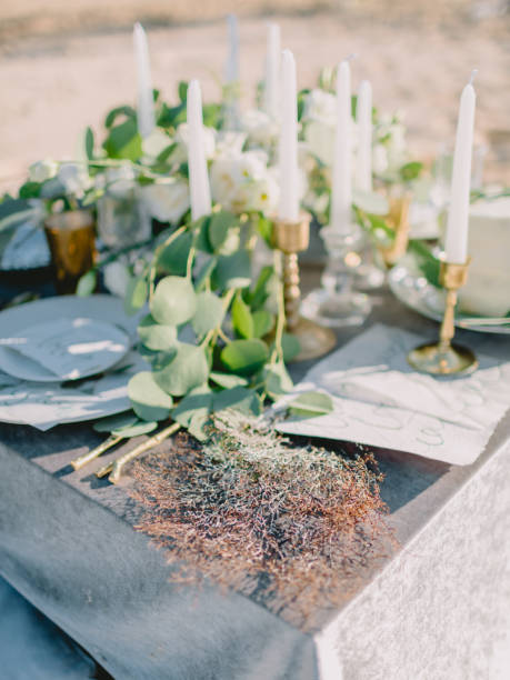 istock Wedding cake with decorations and eucalyptus leaves. Wedding table 1132687157