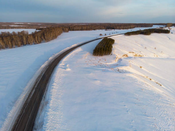 istock Aerial view of a winter road 1132688528