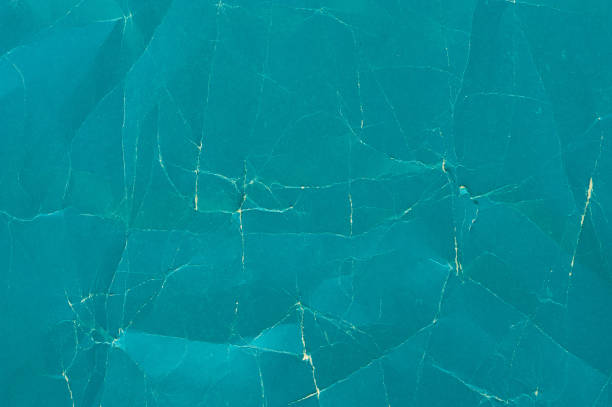 istock Rough cyan paper texture. Abstract grunge background. Coarse detail grain pattern. 1132690167