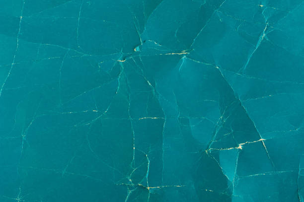 istock Rough cyan paper texture. Abstract grunge background. Coarse detail grain pattern. 1132690169