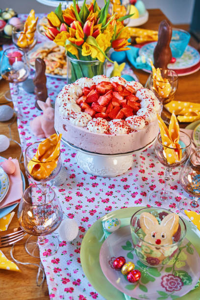 istock Decorated Table for Easter with Easter Eggs, Cookies, Cake and Flowers 1132691127