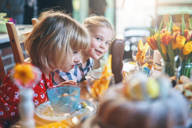 Cute Little Kids Having Fun on a Decorated Easter Table