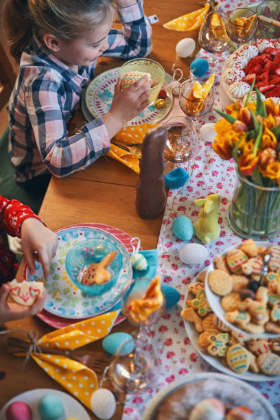 istock Cute Little Kids Having Fun on a Decorated Easter Table 1132691141