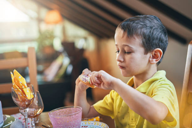 istock Cute Little Kids Having Fun on a Decorated Easter Table 1132691146