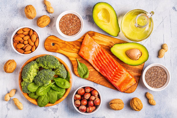 istock Animal and vegetable sources of omega-3 acids. Balanced diet concept. 1132694297
