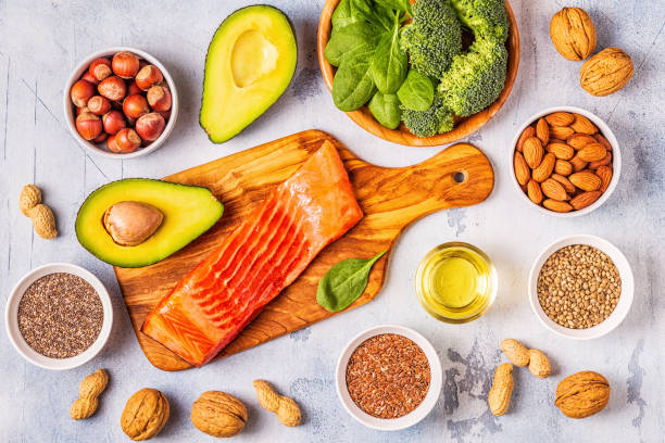 istock Animal and vegetable sources of omega-3 acids. Balanced diet concept. 1132694315