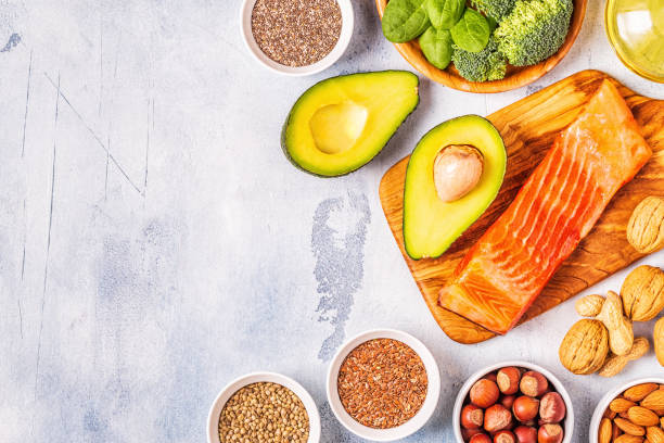 istock Animal and vegetable sources of omega-3 acids. Balanced diet concept. 1132694323