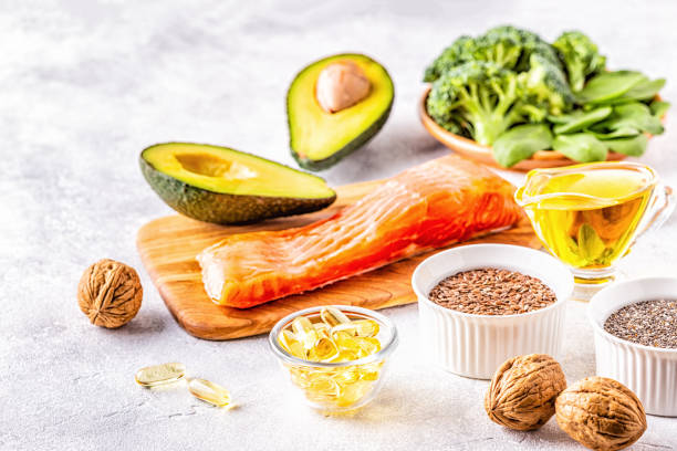 animal and vegetable sources of omega-3 acids. - nutritional supplement salmon food flax imagens e fotografias de stock
