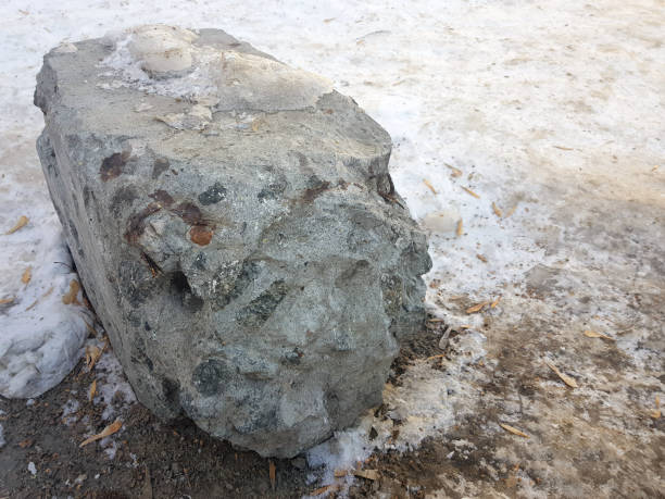 istock old broken concrete block in the snow 1132694388