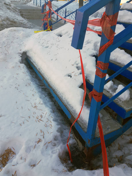 istock uncleaned stairs in the snow 1132694419