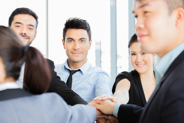 istock Business people putting their hands together. Stack of hands. Unity team and teamwork concept 1132695831