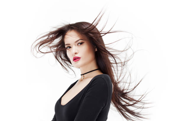 istock Stylish and elegant brunette in black on white background, portrait in Studio 1132698675