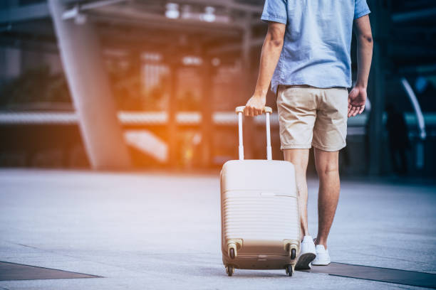istock Traveler with a suitcase in the city. 1132700016