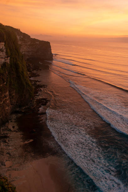 istock powerful nature. amazing sunset on beautiful tropical Bali beach 1132703742