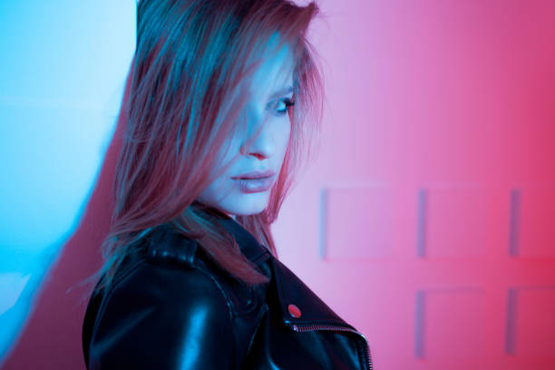 istock Beautiful girl in retro wave on the neon light 1132705056
