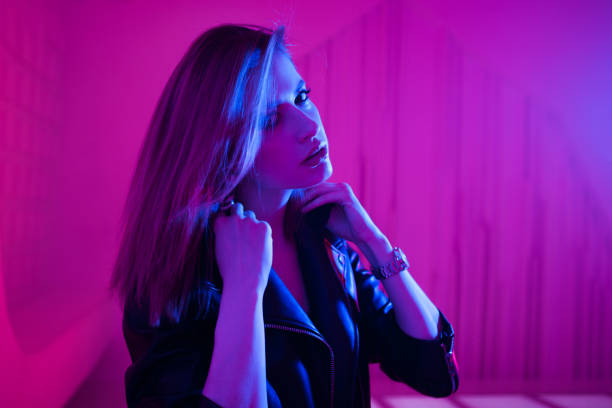 istock Beautiful girl in retro wave on the neon light 1132705057