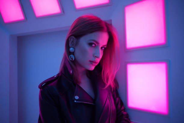 istock Futuristic style portrait in blue and purple light. 1132705065