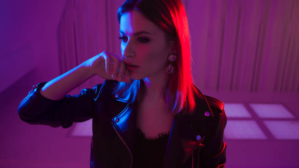 istock Beautiful girl in retro wave on the neon light 1132705067