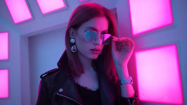 Futuristic style portrait in blue and purple light. stock photo