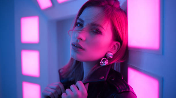 istock Futuristic style portrait in blue and purple light. 1132705093