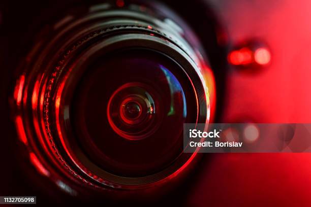 Camera Lens And Red Backlight Horizontal Photography Stock Photo - Download Image Now