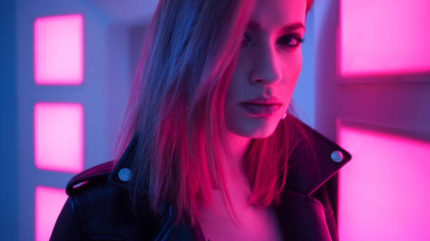 istock Futuristic style portrait in blue and purple light. 1132705101