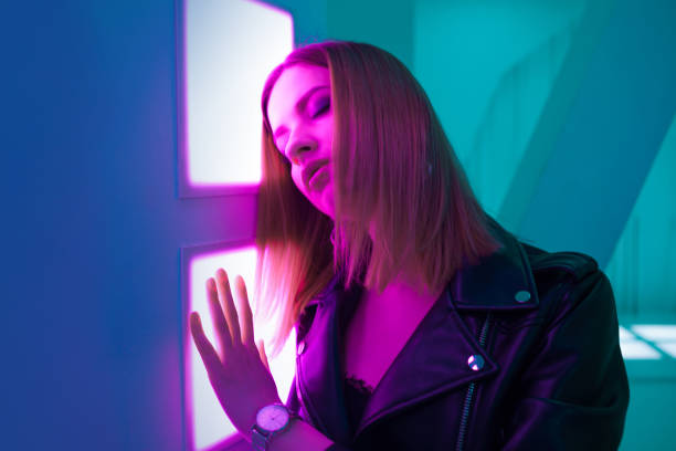 istock Futuristic style portrait in blue and purple light. 1132705133