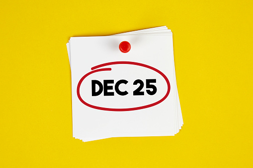 Mark December 25 on the calendar on yellow background