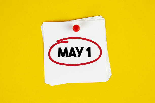 Mark May 1 on the calendar on yellow background