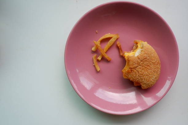 istock Missing bite a half of burger isolated on a white background 1132716356
