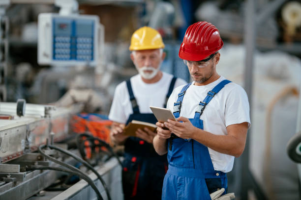 istock Workers in PVC factory 1132720926