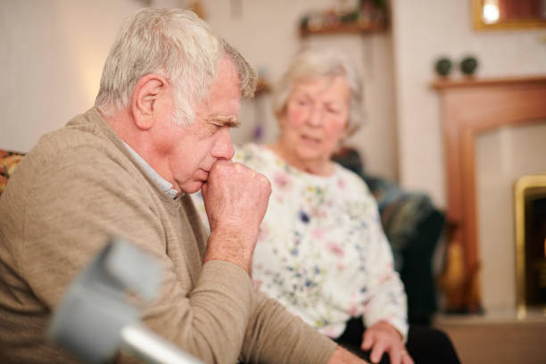 respiratory ill health senior man with wife at home coughing badly bronchitis stock pictures, royalty-free photos & images