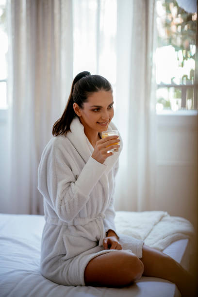 Woman having breakfast in bed