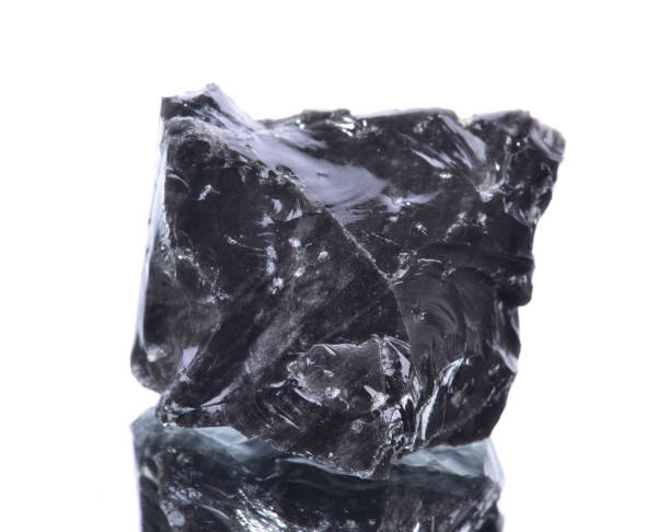 istock macro shooting of natural mineral rock specimen -  obsidian 1132723199