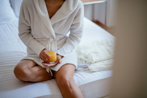 istock Woman having breakfast in bed 1132723280